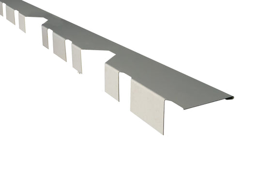 R-Panel/Ag Panel flashing with rib cutouts for metal building siding; transition trim for URESTONE faux stone wainscot.