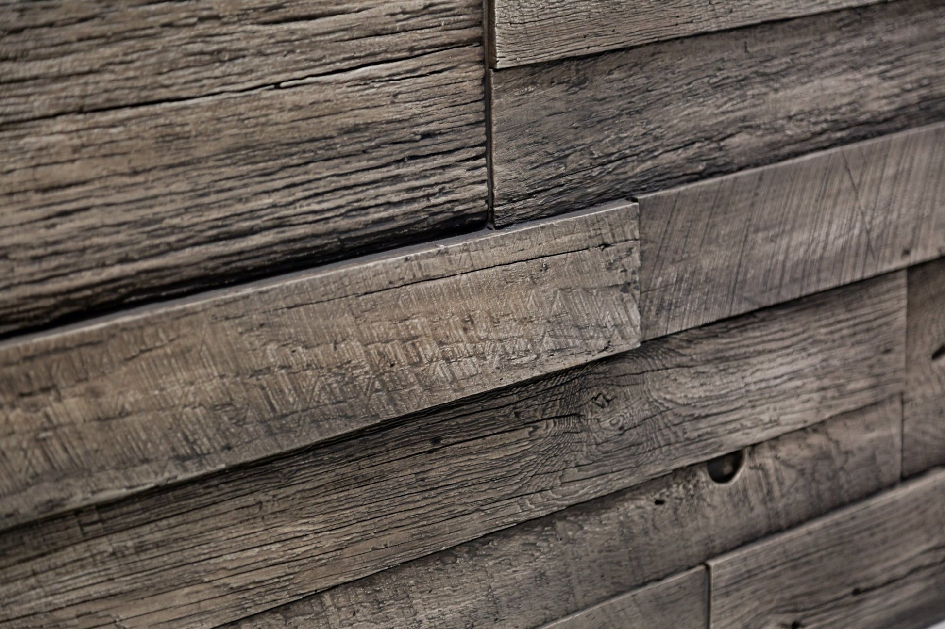 Gray reclaimed faux wood wall panel close-up textured planks with crosscut marks, nail holes, tight seams; realistic 3D grain