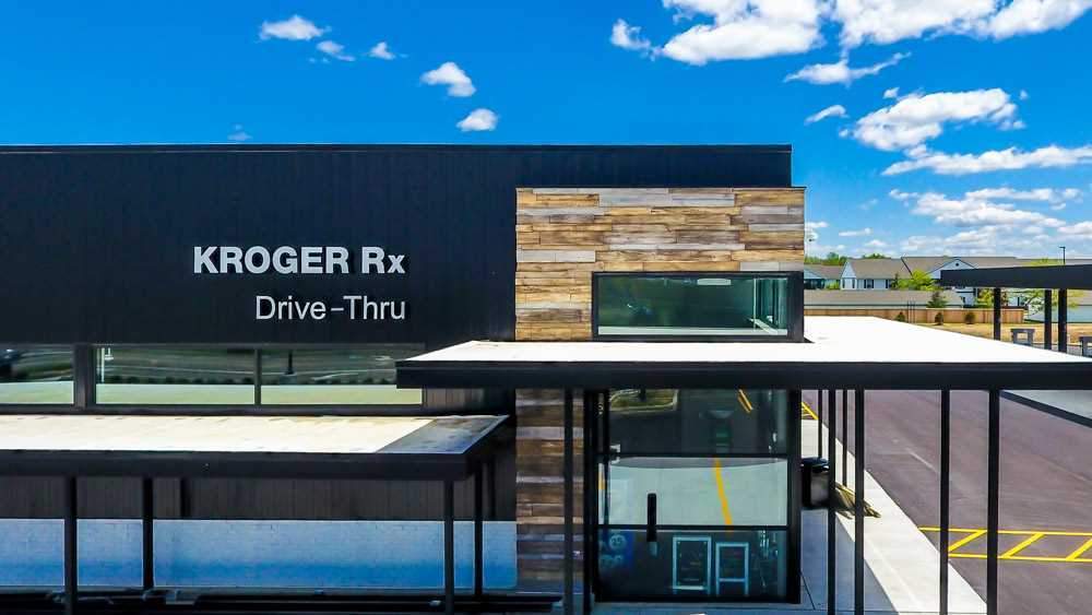 Kroger Rx drive-thru façade clad with URESTONE reclaimed faux wood panels; modern exterior accent.