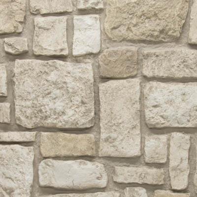 Sample of Urestone Tuscany Almond Taupe faux stone panel with rectangular and square stones in beige taupe with warm white, tan, and very light brown tones hand-painted texture with hyper realistic finish