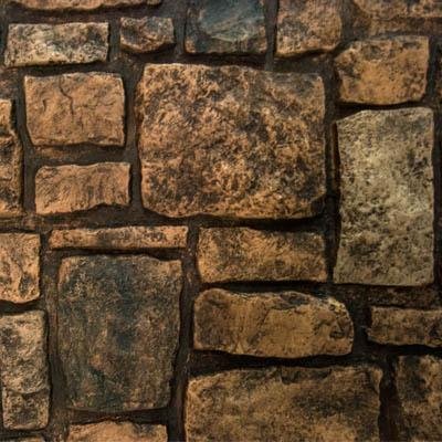 Sample of Tuscany Urestone Fieldstone faux stone panel with rectangular and square stones in chocolate brown, dark warm gray, and near-black; hand-painted texture and dark mortar
