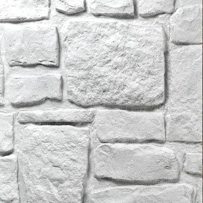 Swatch of Tuscany white faux stone panel with rounded blocks, hand-painted chiseled texture and artisan mortar joints showing a lightweight, realistic wall indoor or outdoor cladding